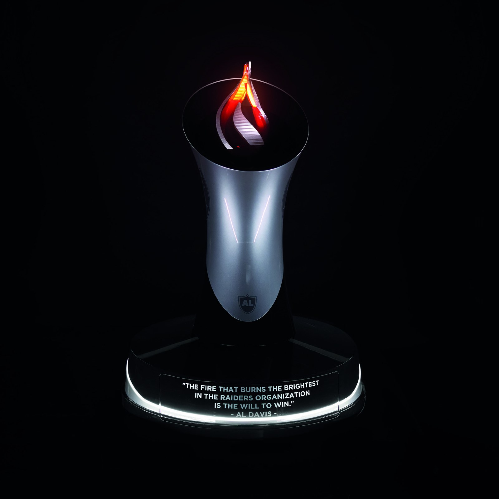 The Al Davis Memorial Torch, presented with the Silver Torch Edition