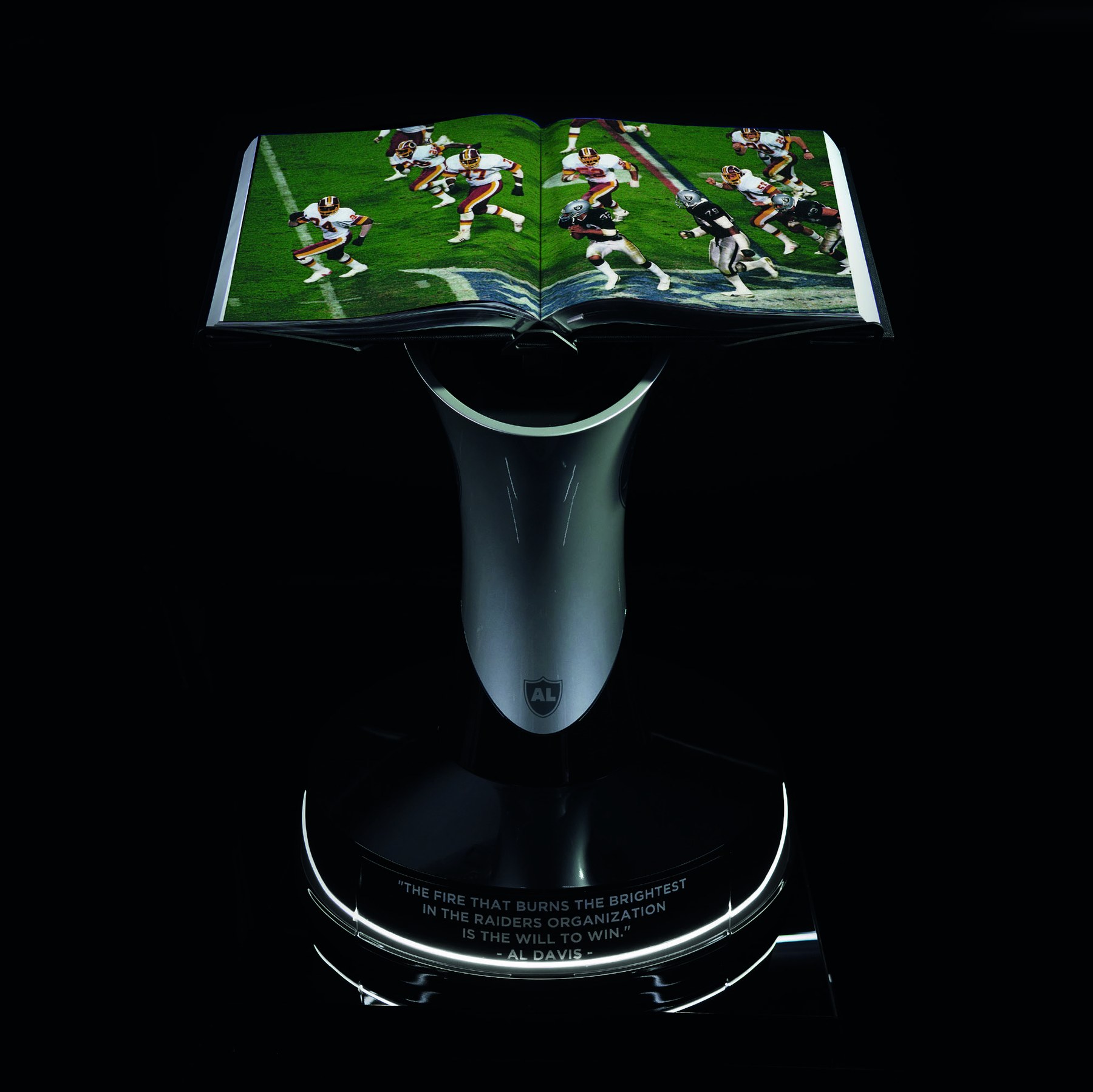 The Raiders Opus displayed open on its torch stand
